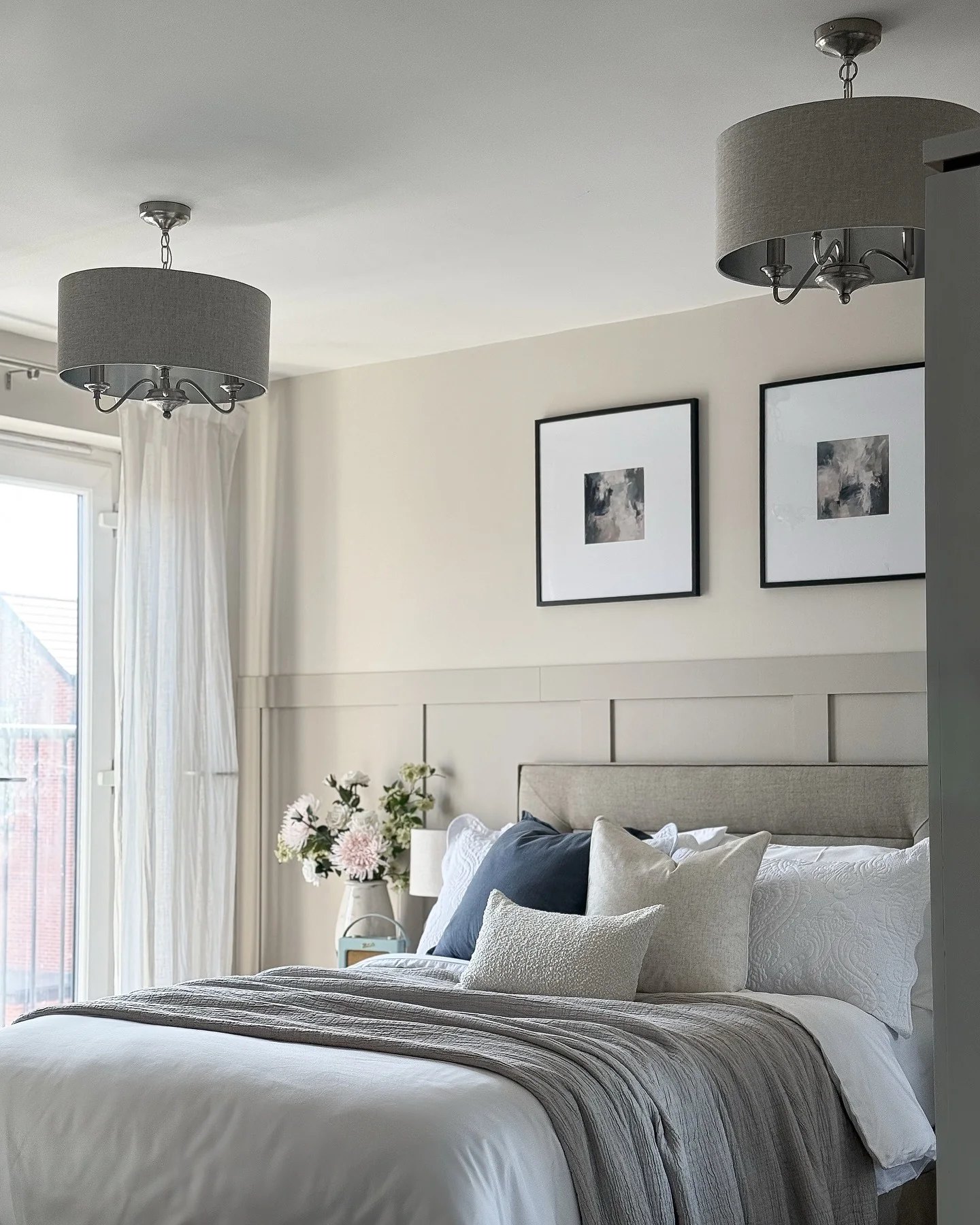 13. Muted Neutrals with Layered Textures (Gray Wall Bedroom Ideas)