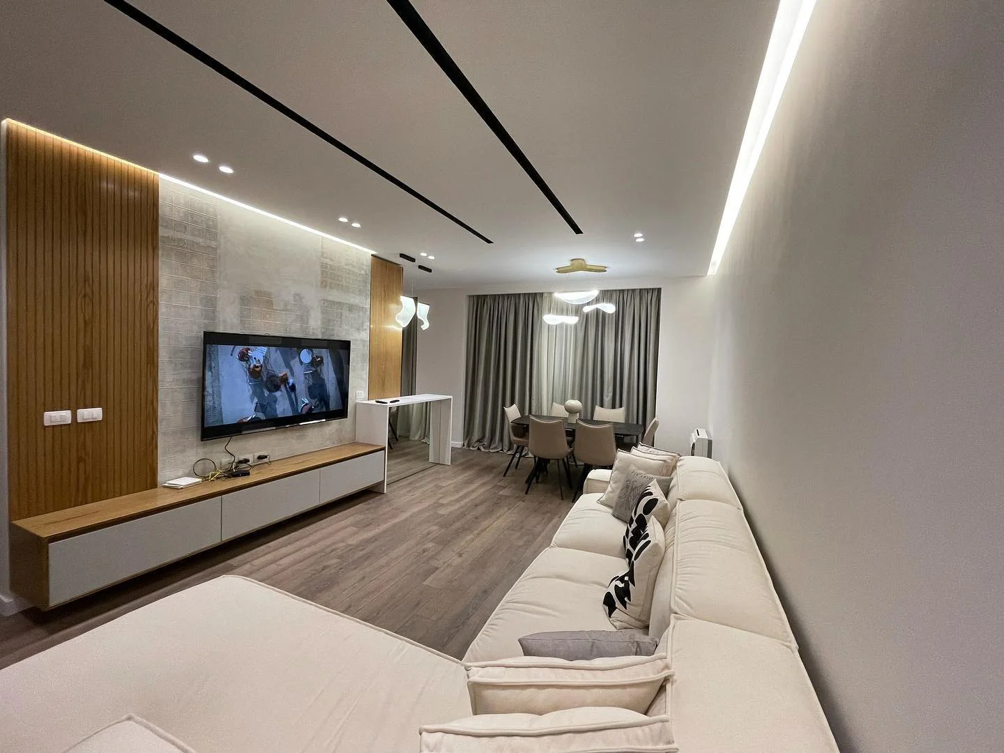 5. Streamlined Urban Living with Mid-Tone Neutrals (Living Room Furniture Ideas)