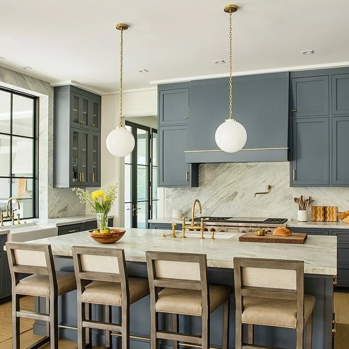 5. Bold Blue Cabinetry with Marble Detailing (Gray and Blue Kitchen Ideas)