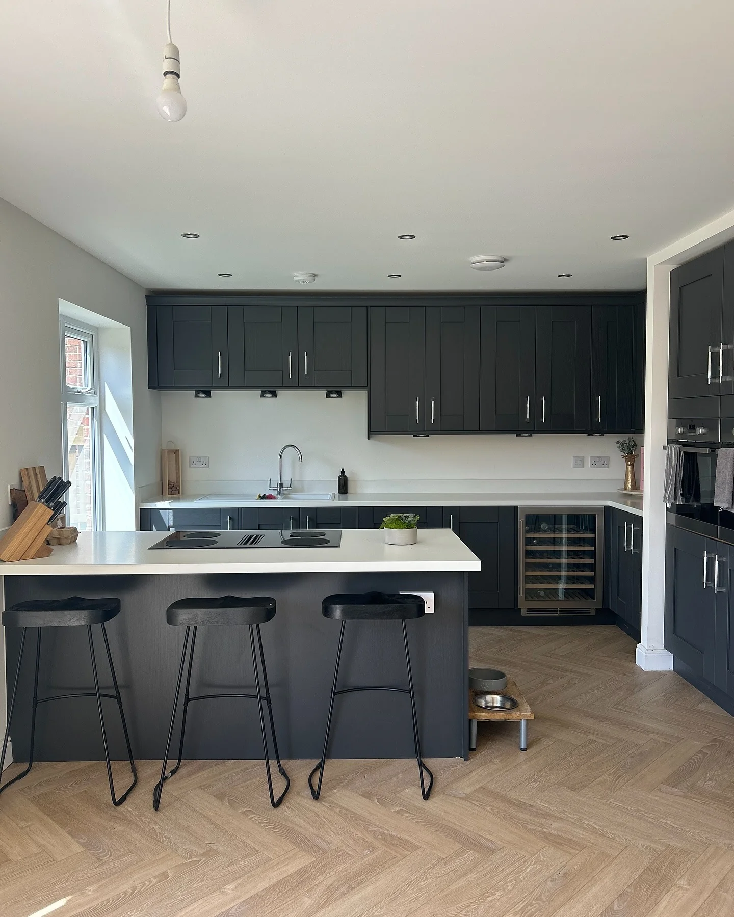 8. Matte Graphite Kitchen with Light Wood Flooring (Gray and Blue Kitchen Ideas)