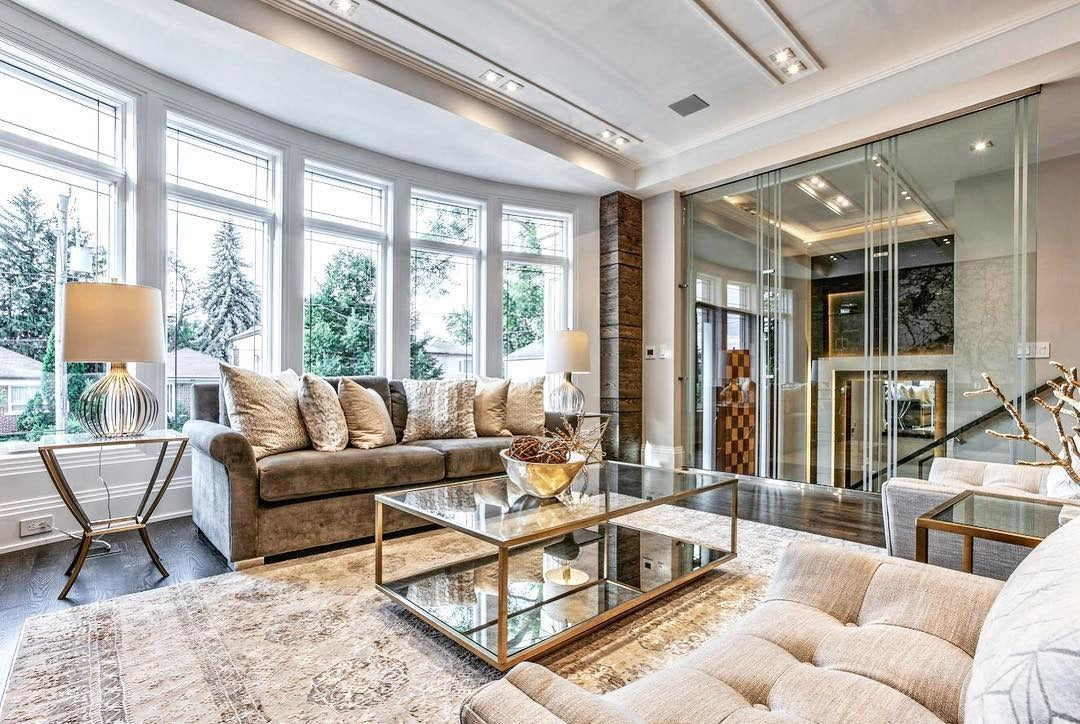 9. Neutral Sophistication with Reflective Gold (Gold Living Room Ideas)