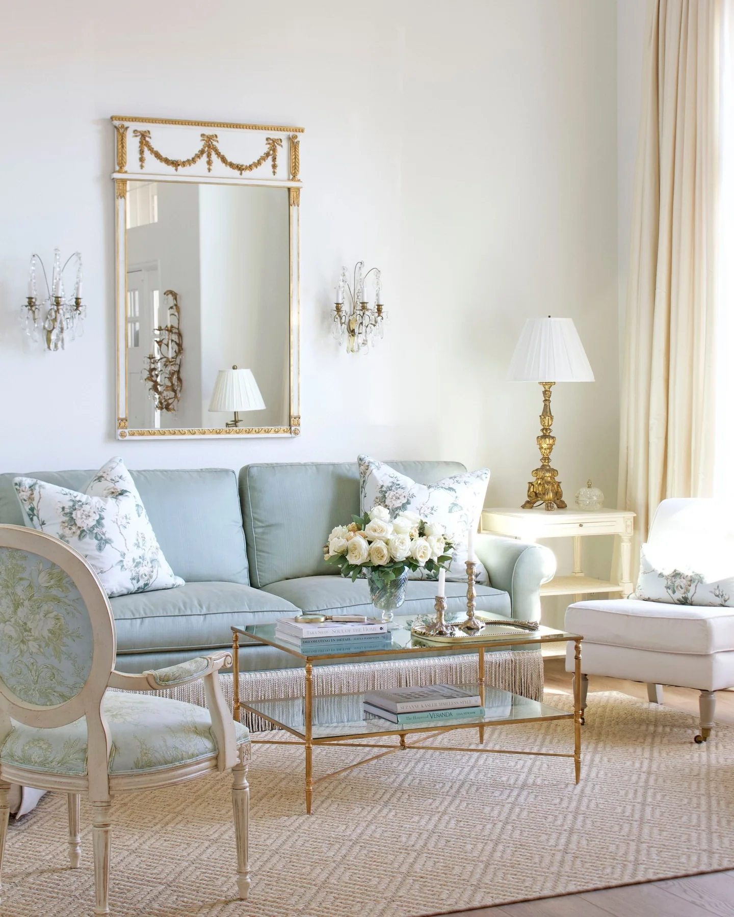 2. Soft Traditional Elegance with Golden Accents (Living Room Mirror Ideas)