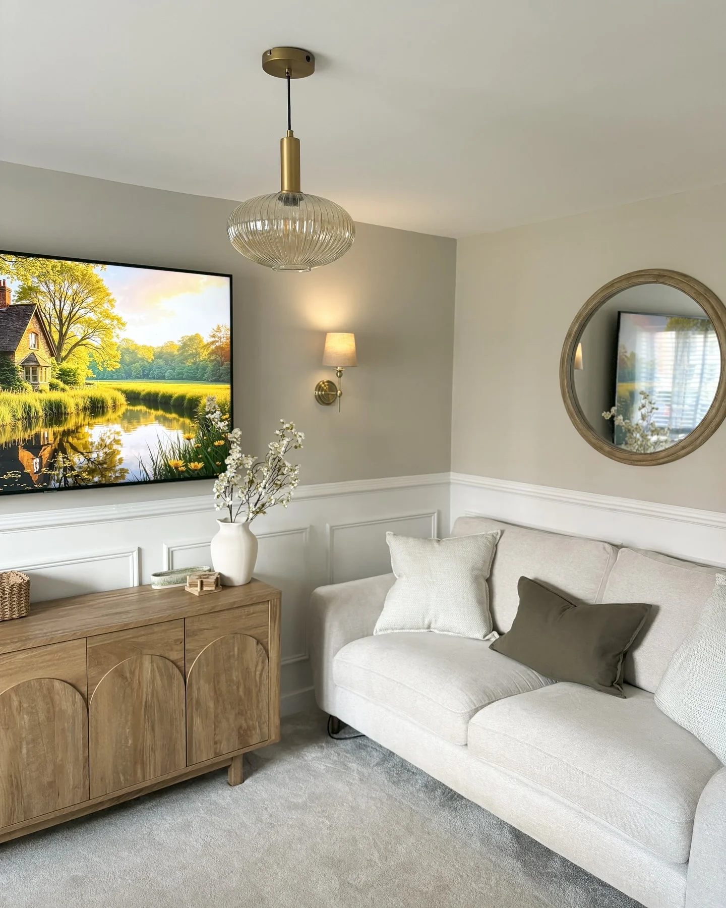 6. Warm Transitional with Rounded Balance (Living Room Mirror Ideas)