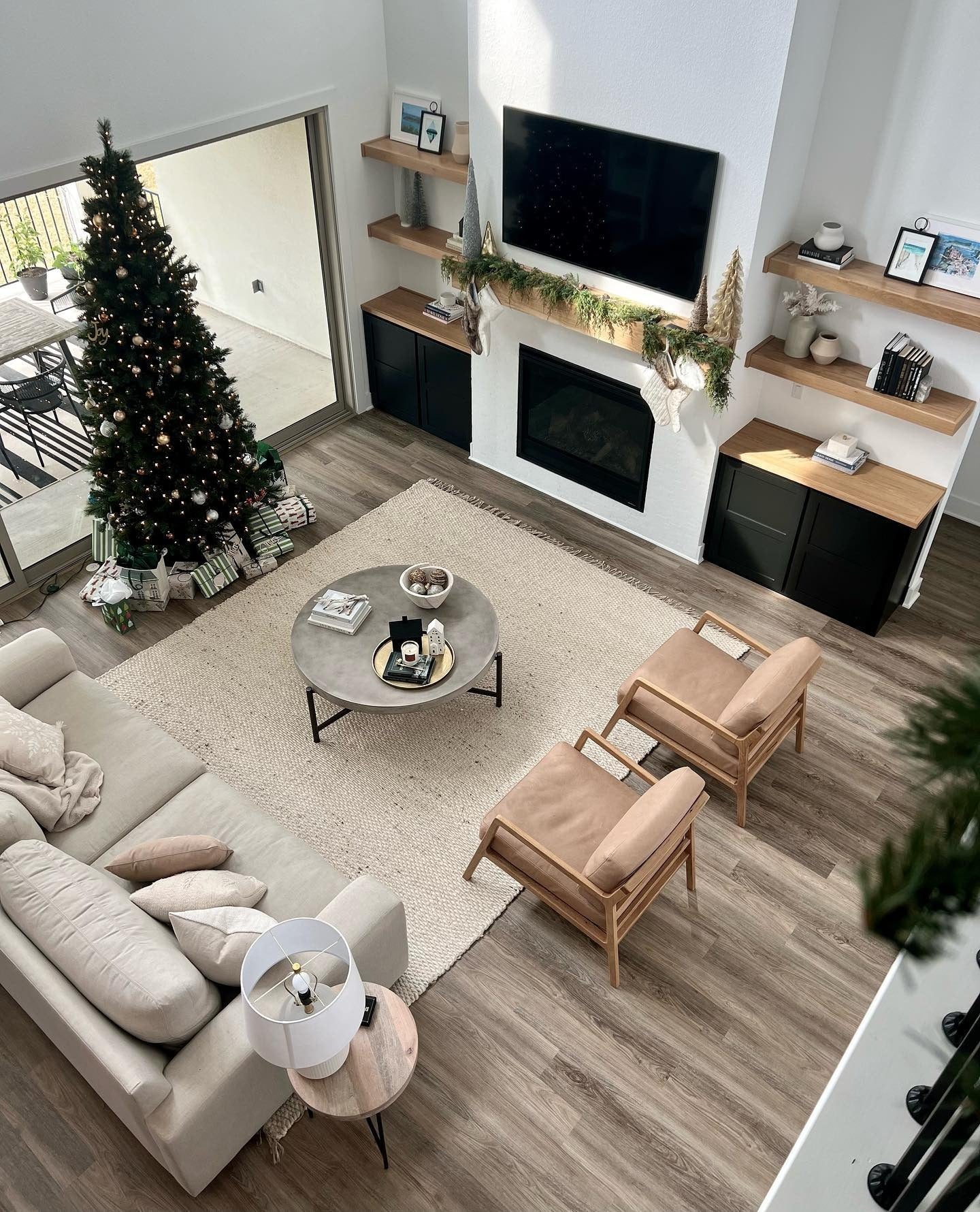 6. Modern Simplicity with Natural Greenery (Christmas Living Room Decor Ideas)