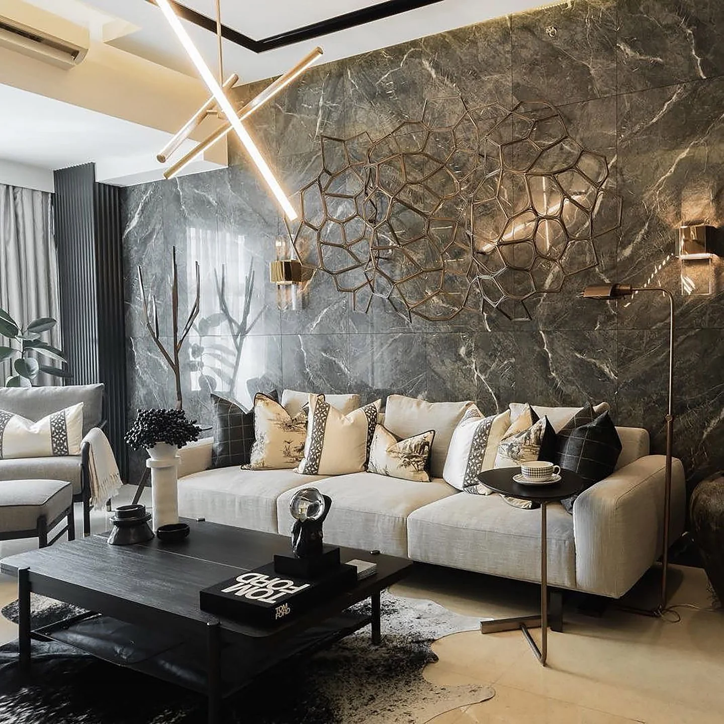 6. Glamorous Contrast with Natural Stone (Black Furniture Living Room Ideas)