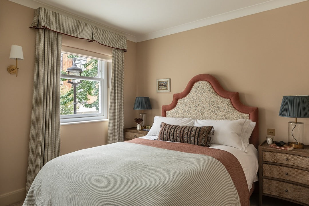 7. English Cottage Comfort in Rust and Neutrals (European Style Bedroom Ideas)