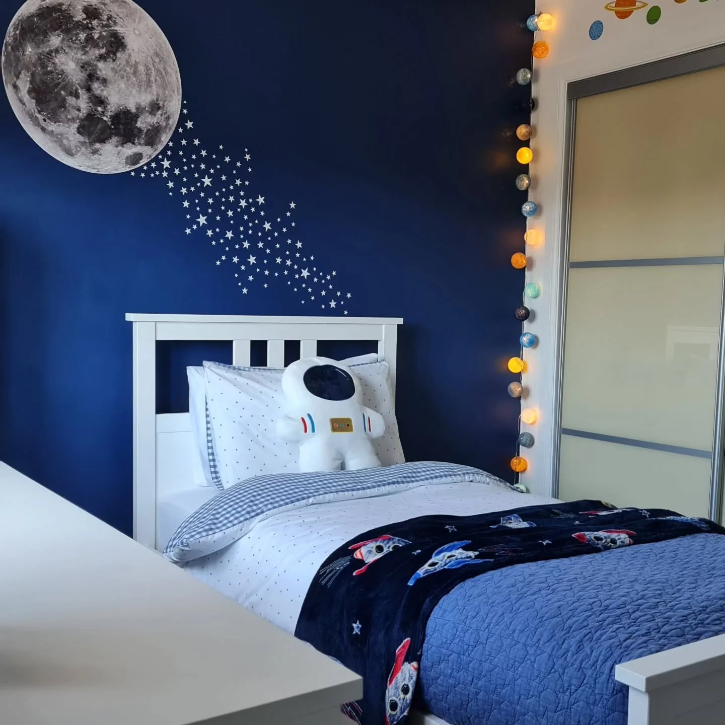 4. Lunar Glow Minimalist Corner (Space Bedroom Ideas)
