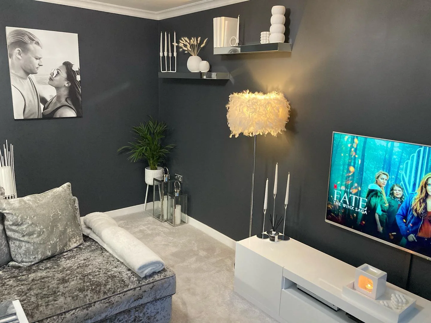 10. High-Contrast Cozy Corner (Dark Grey Living Room Ideas)