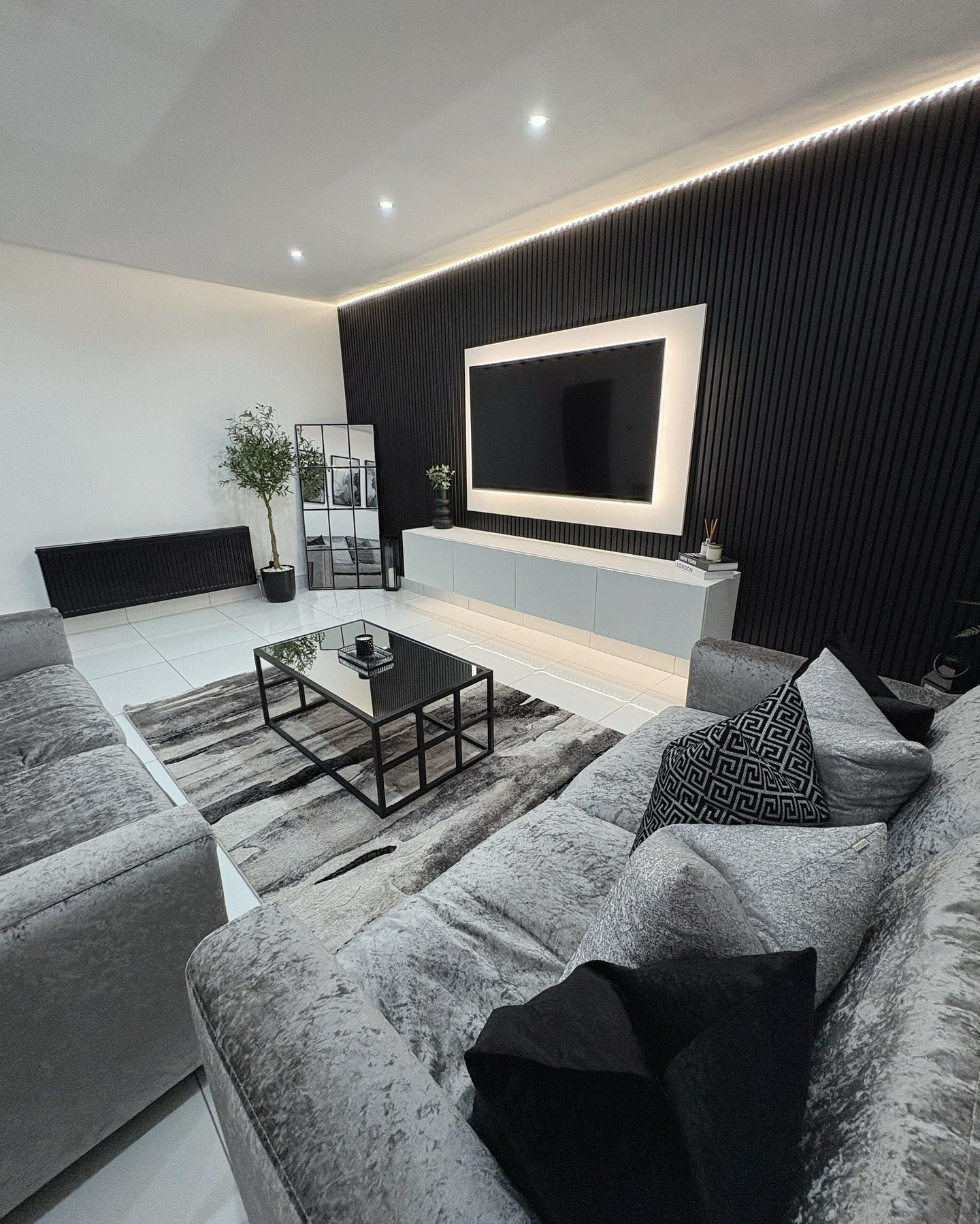 12. Bold Texture with Monochrome Drama (Dark Grey Living Room Ideas)