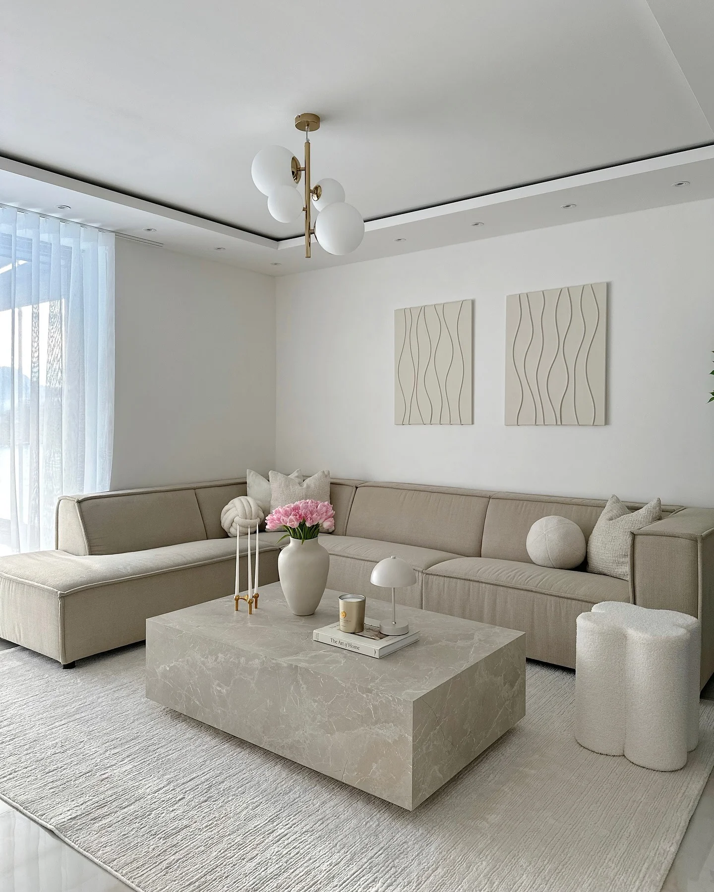 14. Contemporary Elegance with Tonal Balance (Beige Couch Living Room Ideas)
