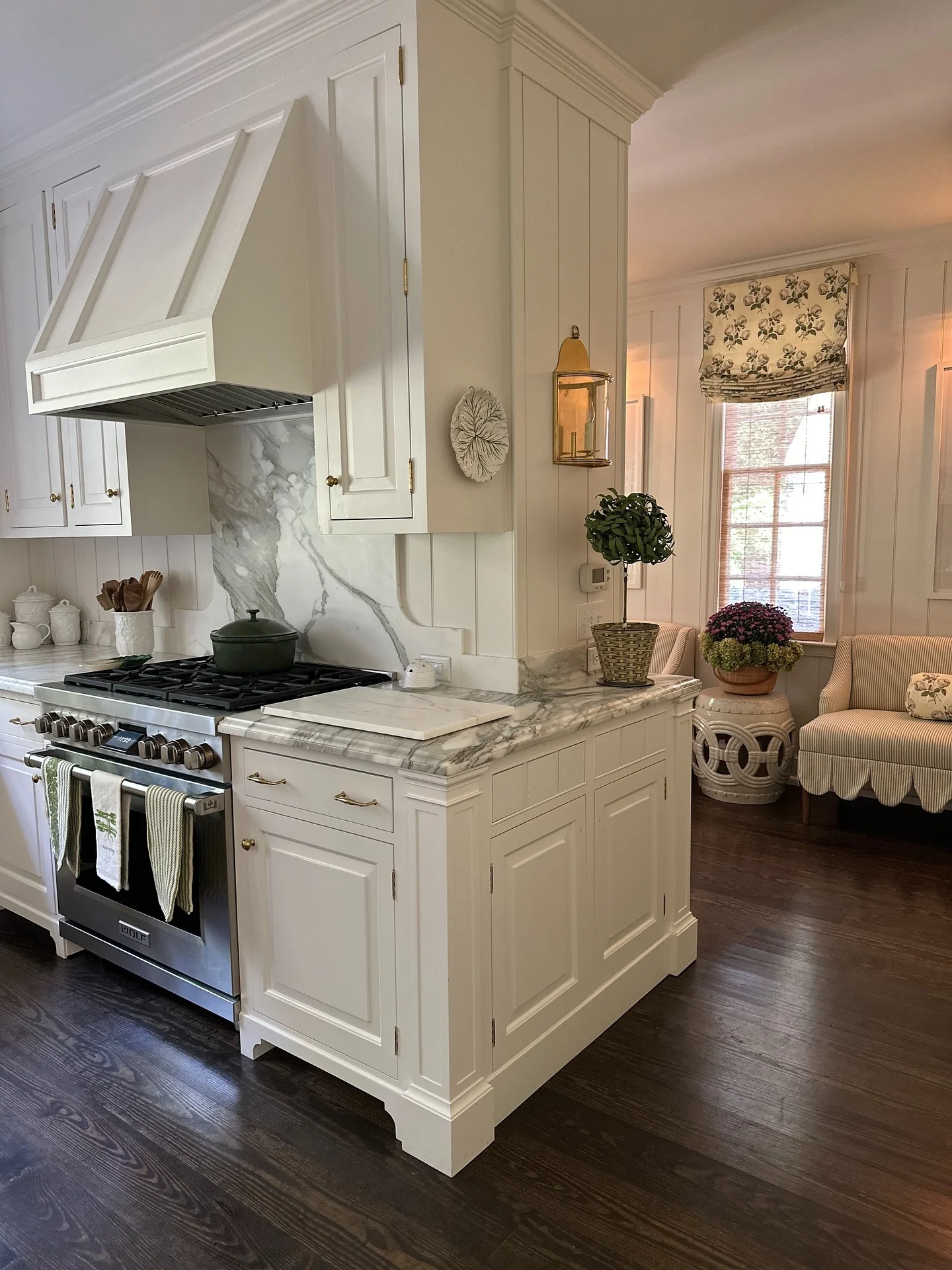 6. Timeless Traditional with White Paneled Cabinets and Marble (Living Room and Kitchen Ideas)