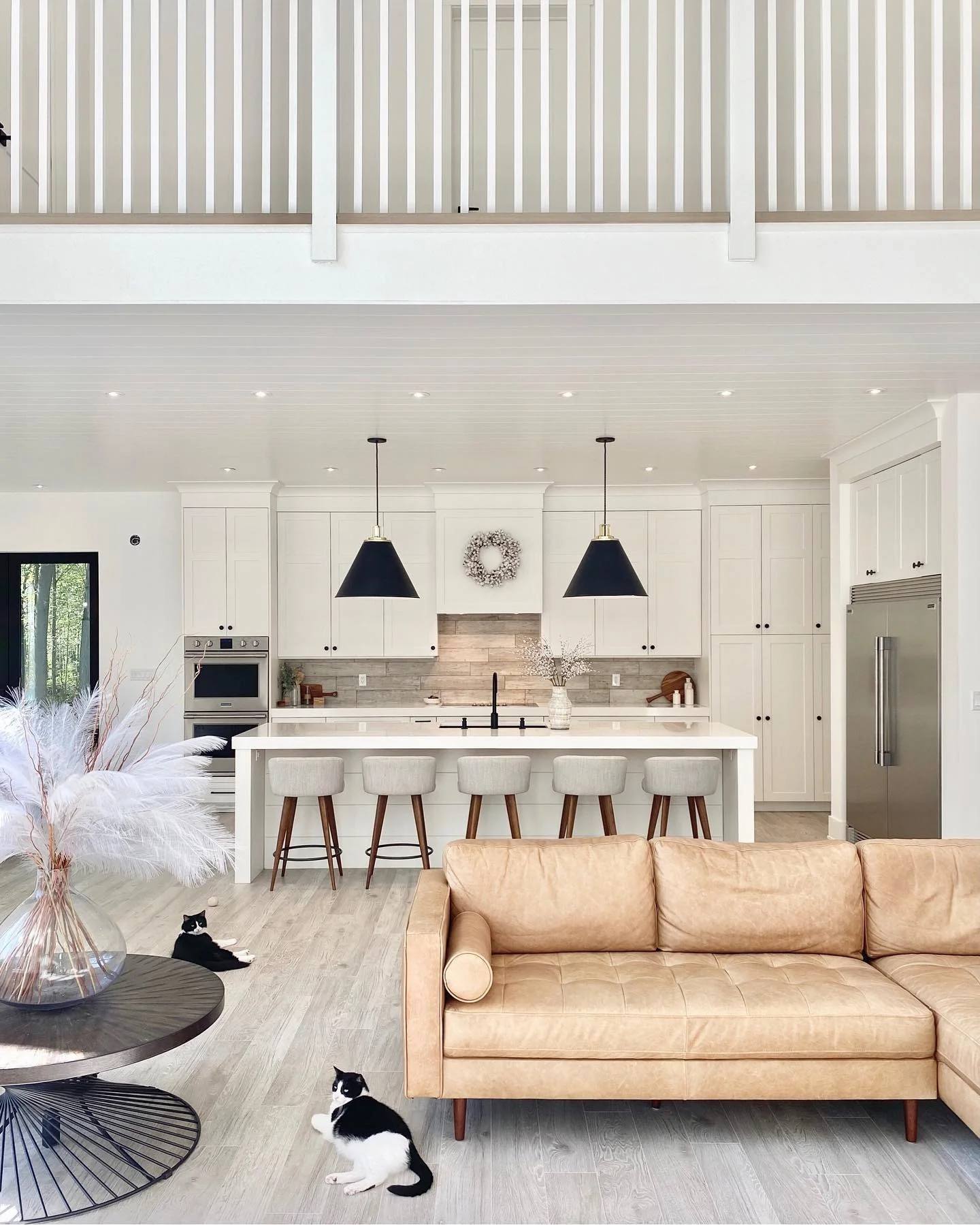 8. Contemporary Cottage with Light Wood and Simple Styling (Living Room and Kitchen Ideas)