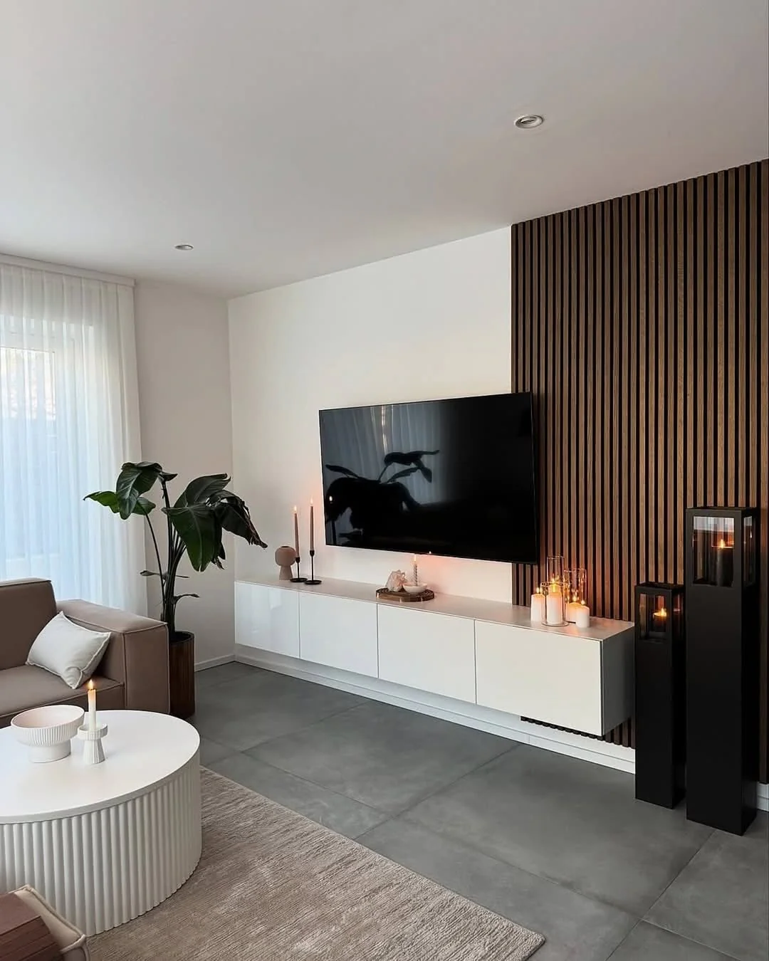 5. Candles and Clean Lines with a Nordic Edge (Accent Wall Ideas for Living Room)