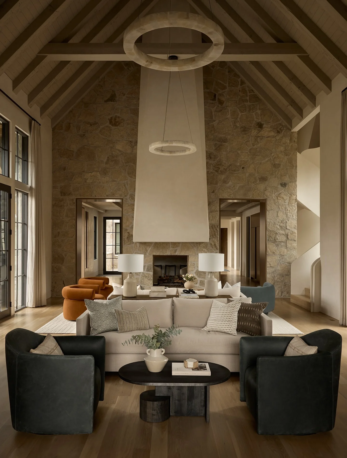 7. Grand Scale Neutrality with Architectural Beams (Accent Wall Ideas for Living Room)