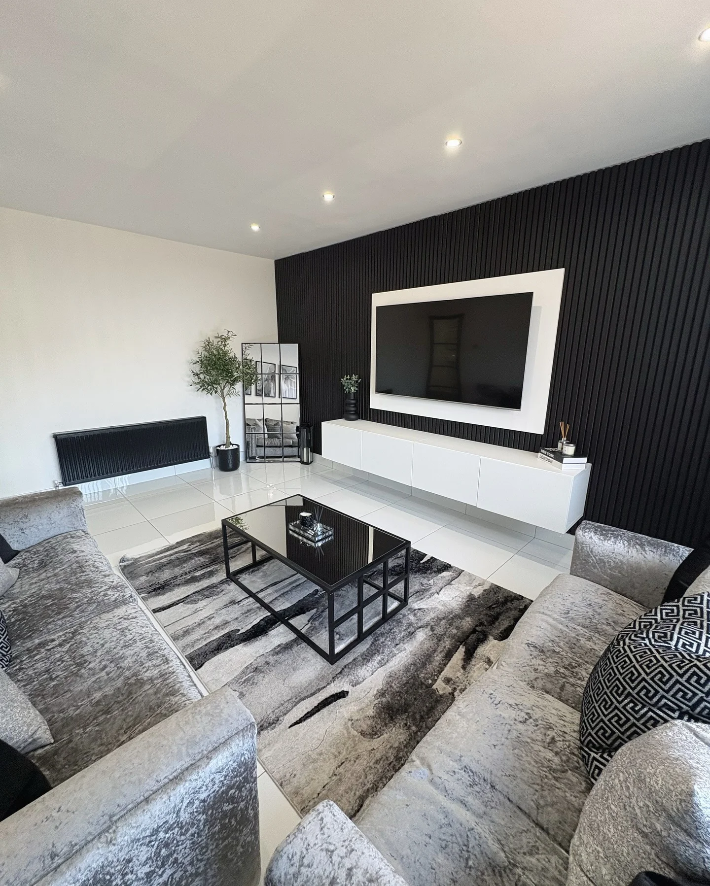 12. Charcoal Slats with Crisp Contrast (Accent Wall Ideas for Living Room)