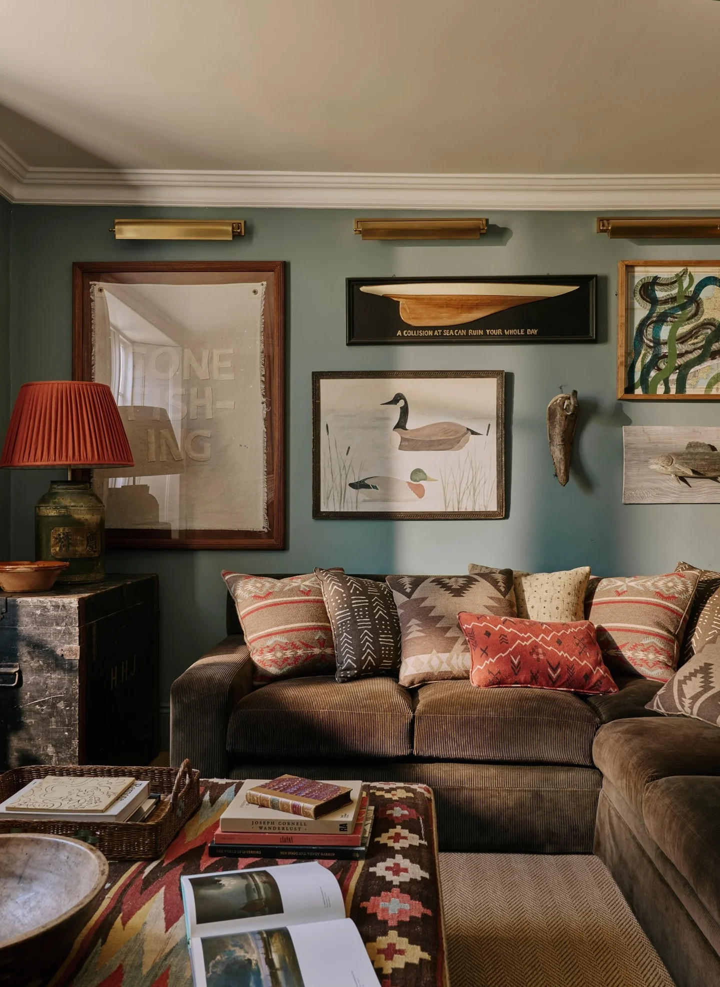 4. Earthy Tones with Cabin-Inspired Texture (Gallery Wall Living Room Ideas)