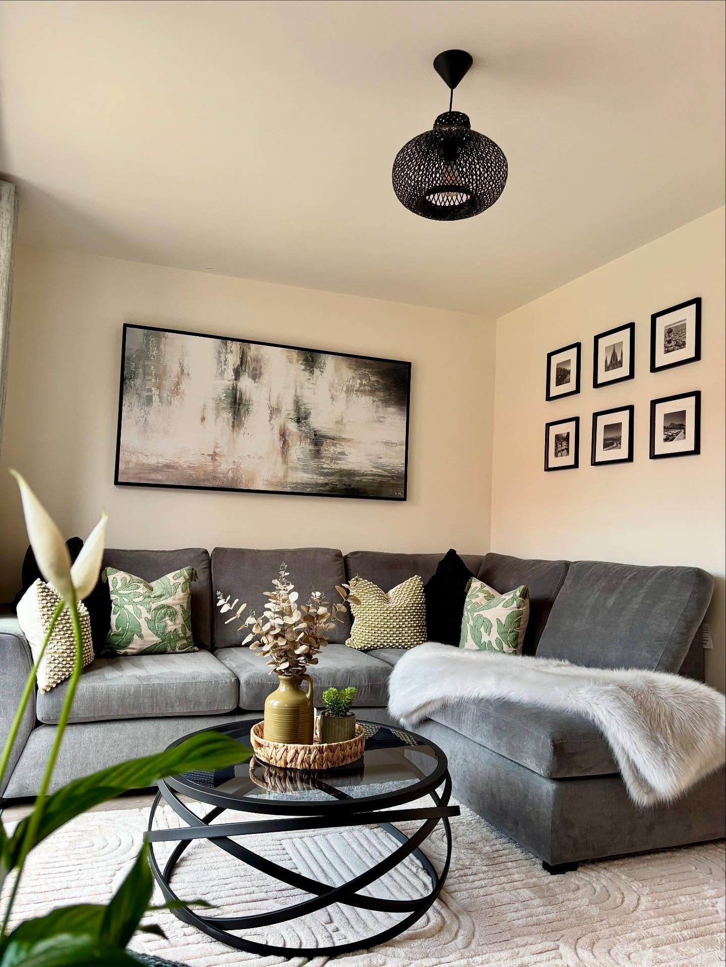 15. Contemporary Contrast with Natural Neutrals (Gallery Wall Living Room Ideas)