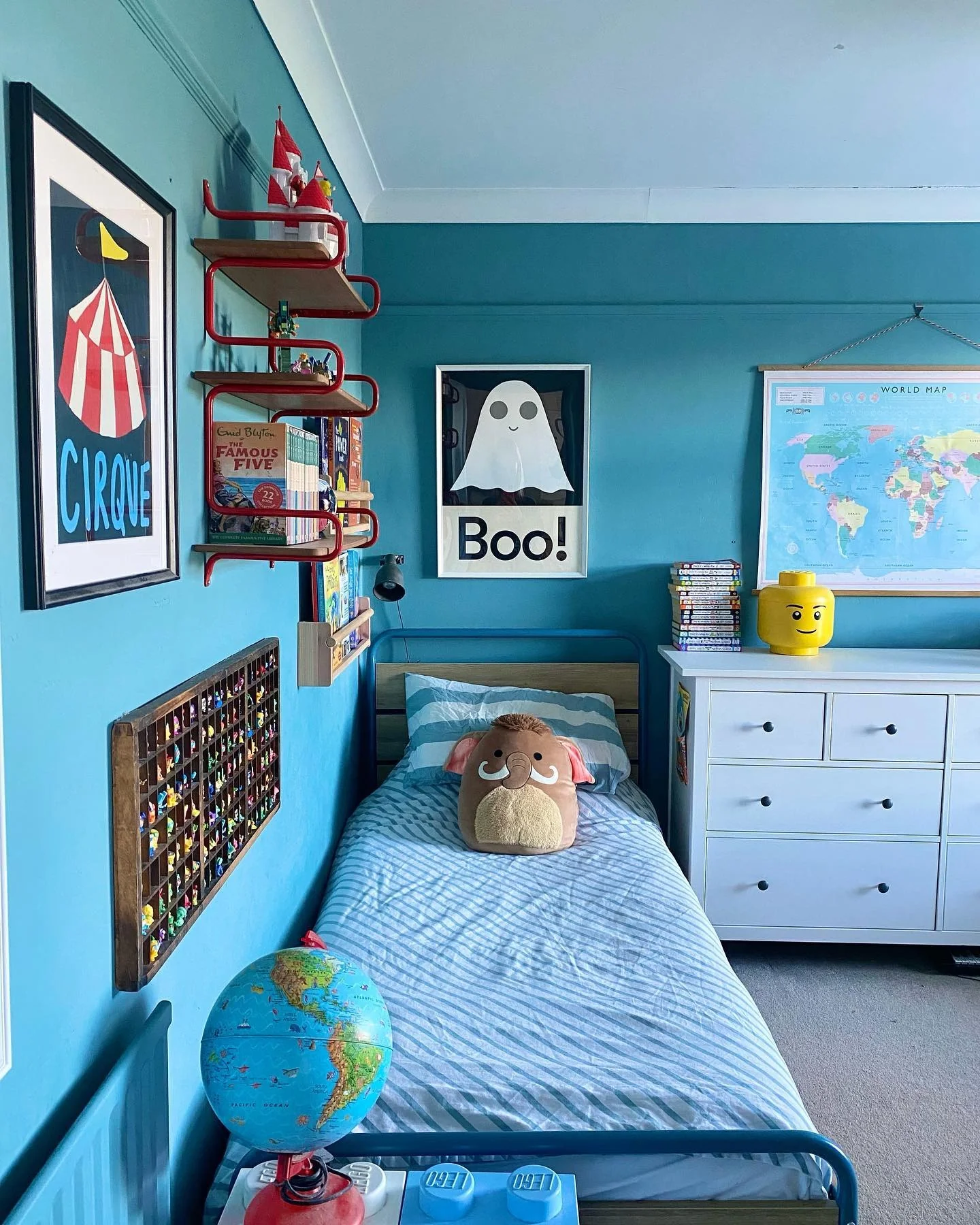 13. Vibrant Blue Adventure Room with Graphic Decor (childrens bedroom ideas)