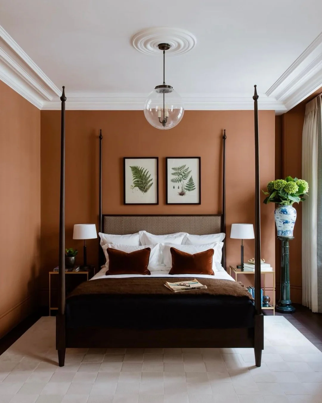 8. Terracotta Sophistication with Vintage Black Accents (Dark Wood Bedroom Ideas)