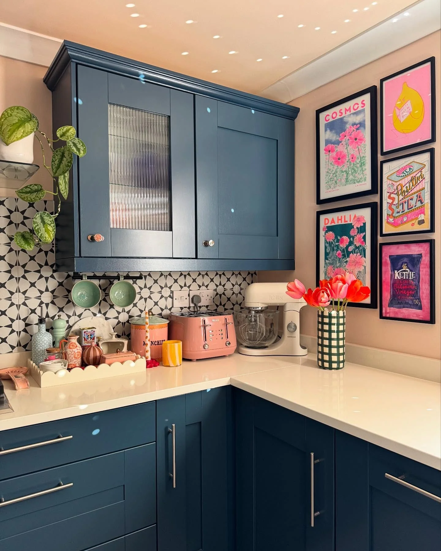 3. Navy Blue with Playful Retro Accents (Kitchen Cabinet Color Ideas)