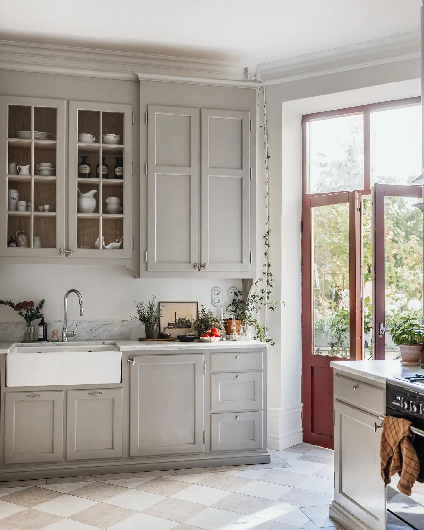 6. Mushroom Taupe with Timeless Detailing (Kitchen Cabinet Color Ideas)