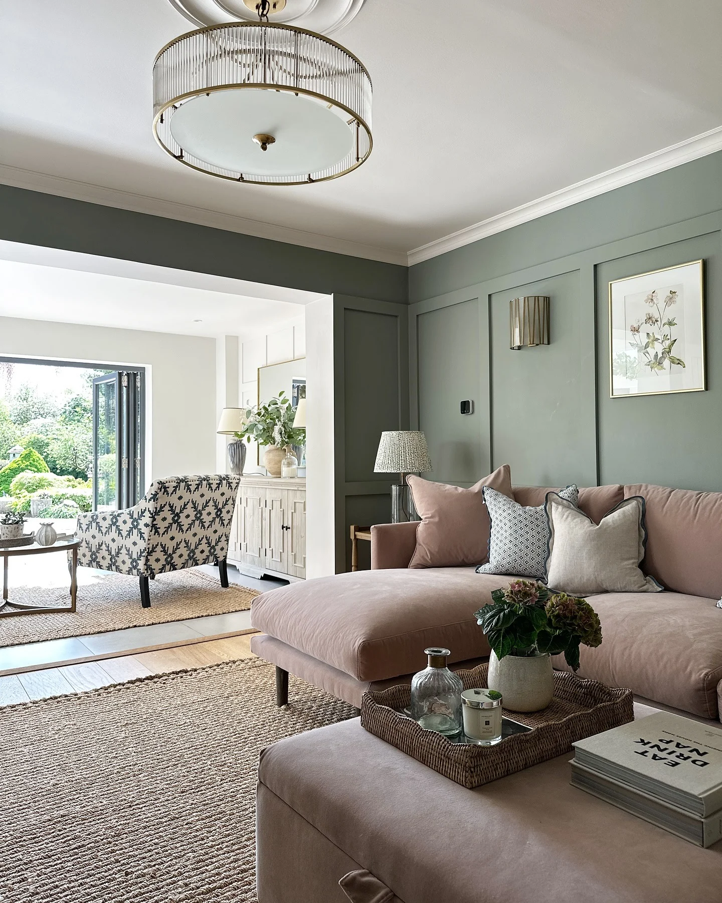 8. Warm Greens and Soft Rose Contrast (Sage Green Living Room Ideas)