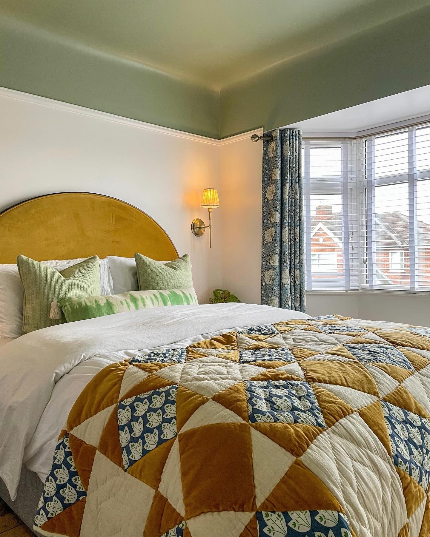 5. Soft Green Ceiling Drama (Light Green Bedroom Ideas)