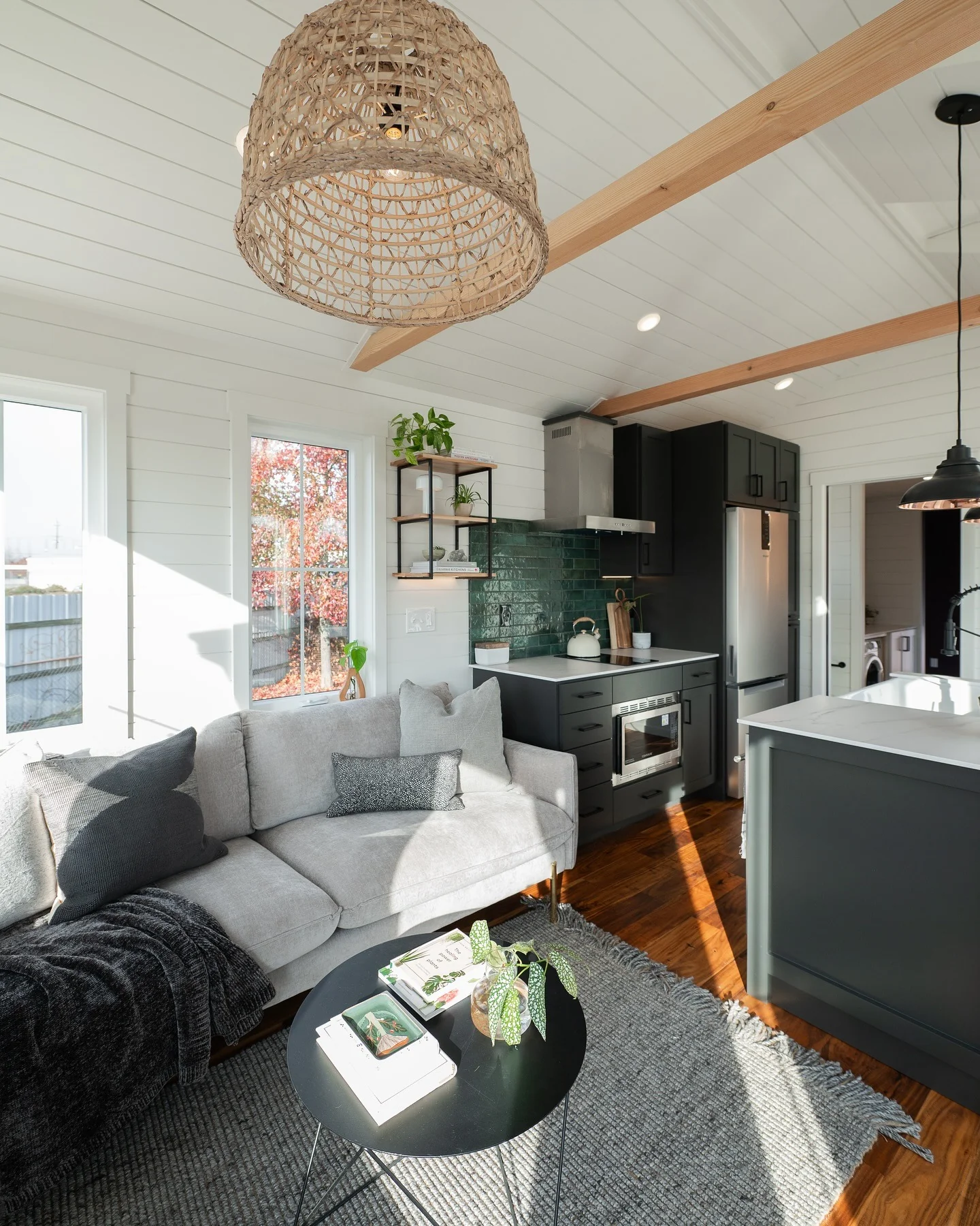 14. Earthy Greens and Black Accents (Tiny Living Room Ideas)