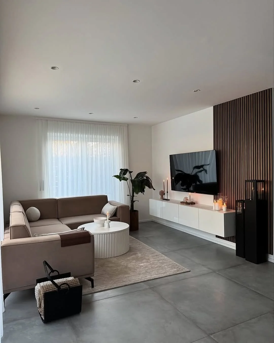 5. Streamlined Monochrome with Warm Accents (Living Room Floor Ideas)