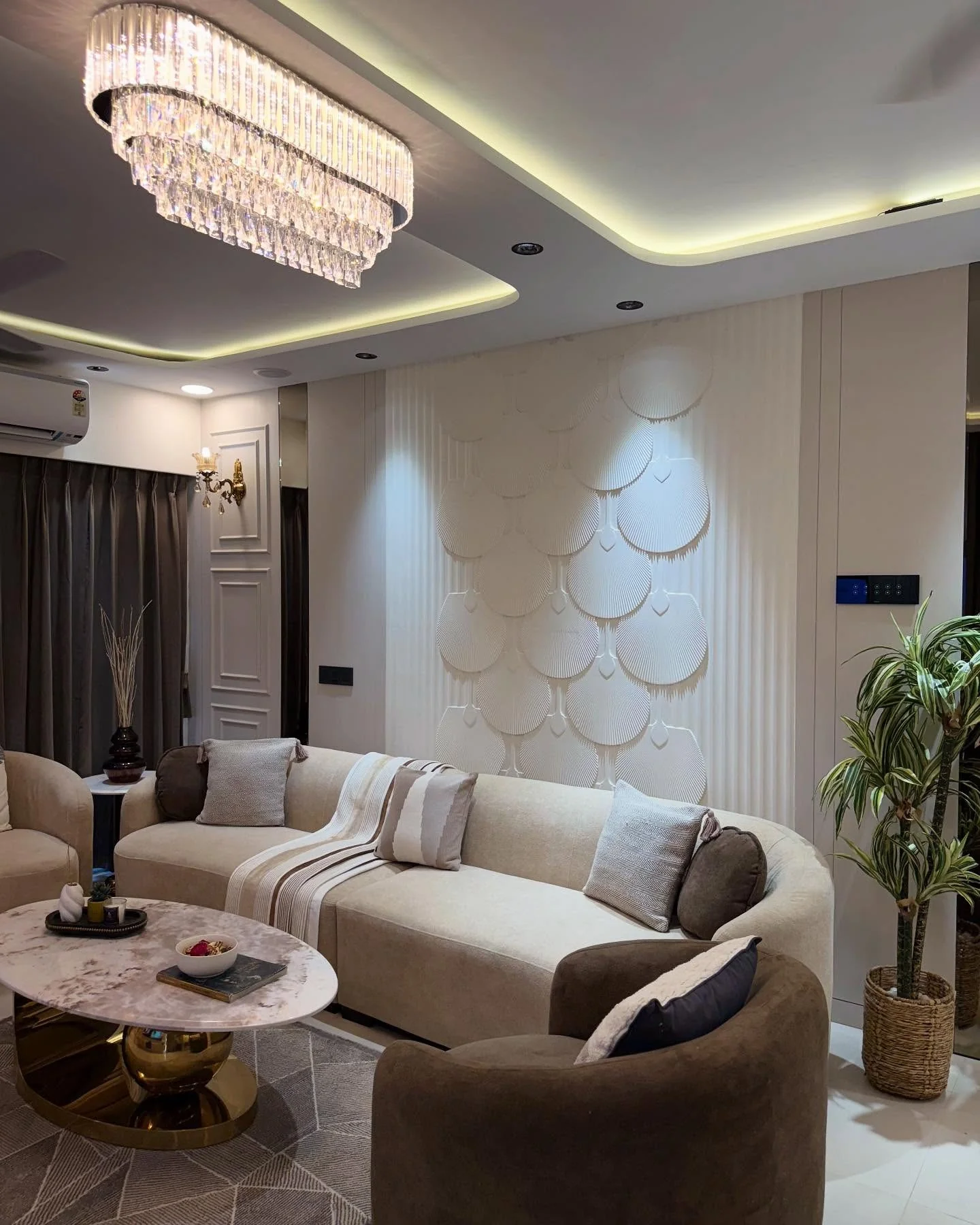 2. Warm Contemporary With Sculptural Accents (Formal Living Room Ideas)