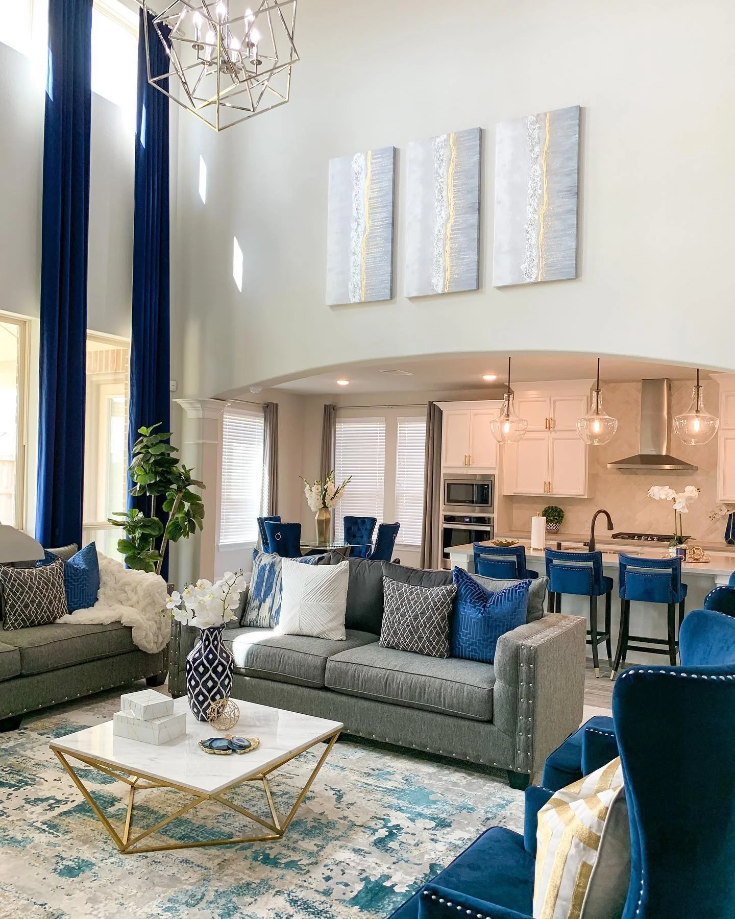 4. Glamorous Grandeur in Champagne and Gold (Formal Living Room Ideas)