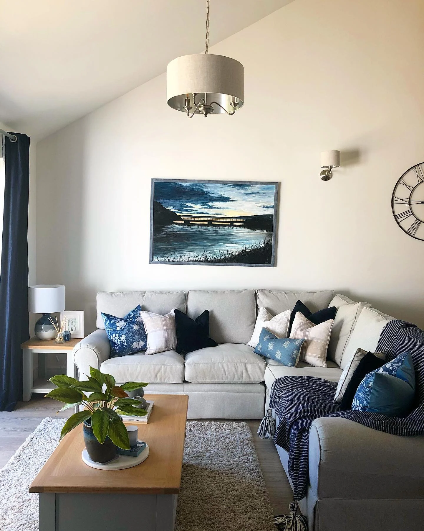 5. Cozy Neutrals with Navy Touches (Blue and Grey Living Room Ideas)