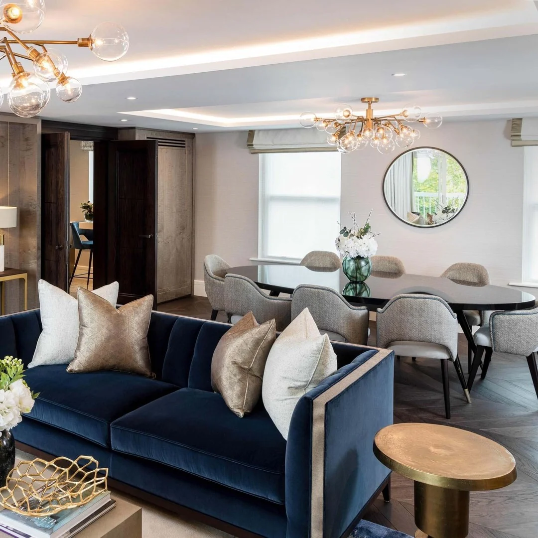 6. Urban Sophistication with Sapphire Upholstery (Blue and Grey Living Room Ideas)