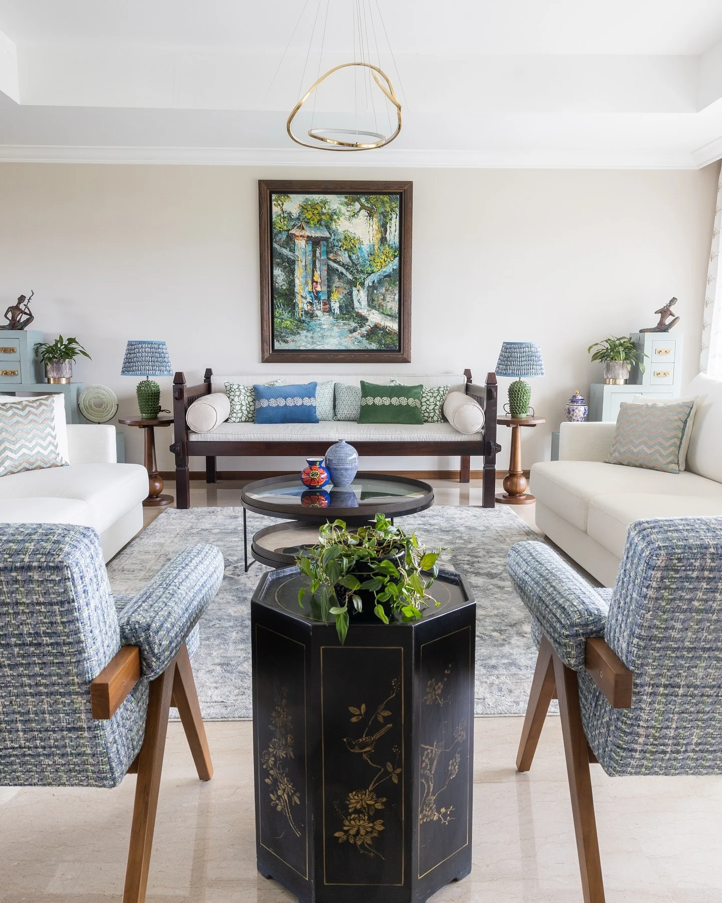 12. Textural Harmony with Blue and Botanical Accents (Blue and Grey Living Room Ideas)