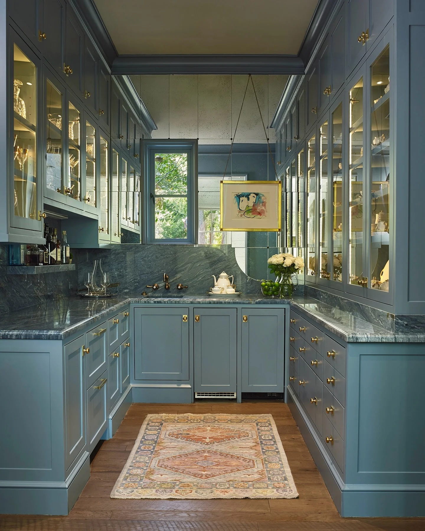 6. Refined Blue Cabinetry with Dual-Pane Window and Gilded Fixtures (Kitchen Window Ideas)