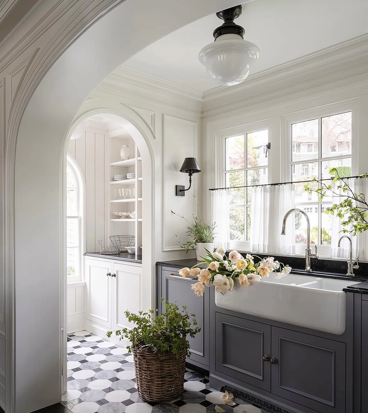 3. Monochrome Elegance with Soft Draped Café Curtains (Kitchen Window Ideas)