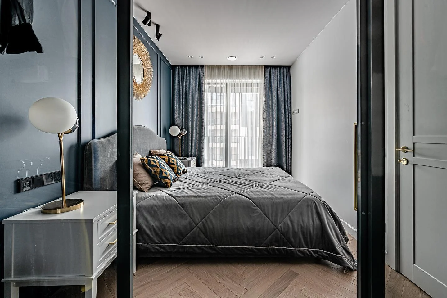 2. Compact Chic in Blue and Grey (Dark Blue Bedroom Ideas)