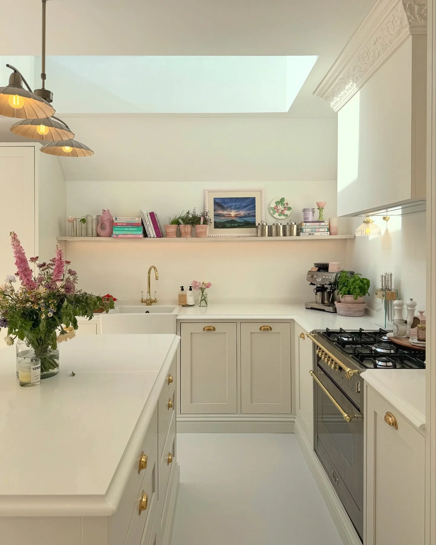 5. Refined Ivory with Brass Detailing (Victorian Style Kitchen Ideas)