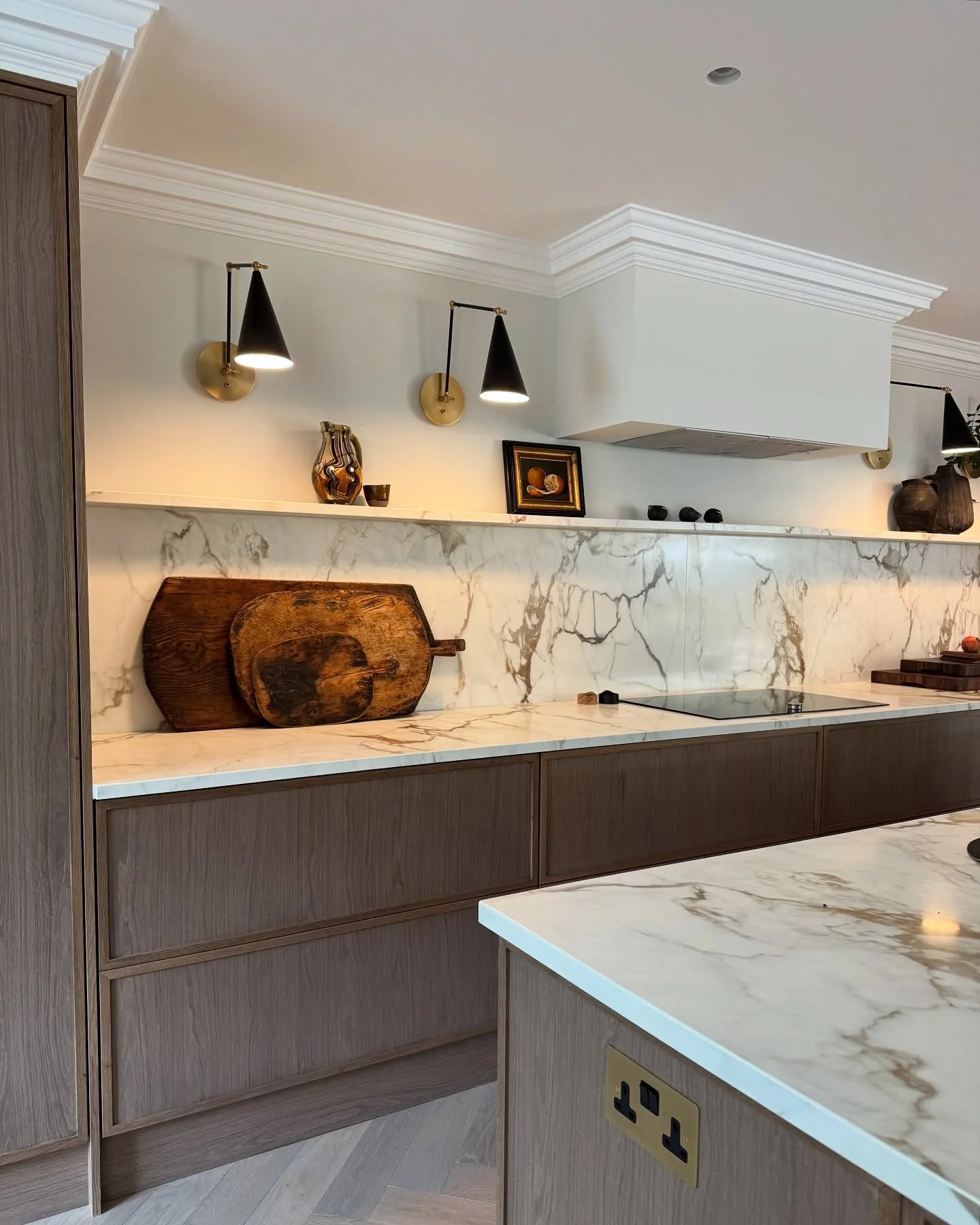 9. Veined Marble with Sculptural Sconces (Victorian Style Kitchen Ideas)