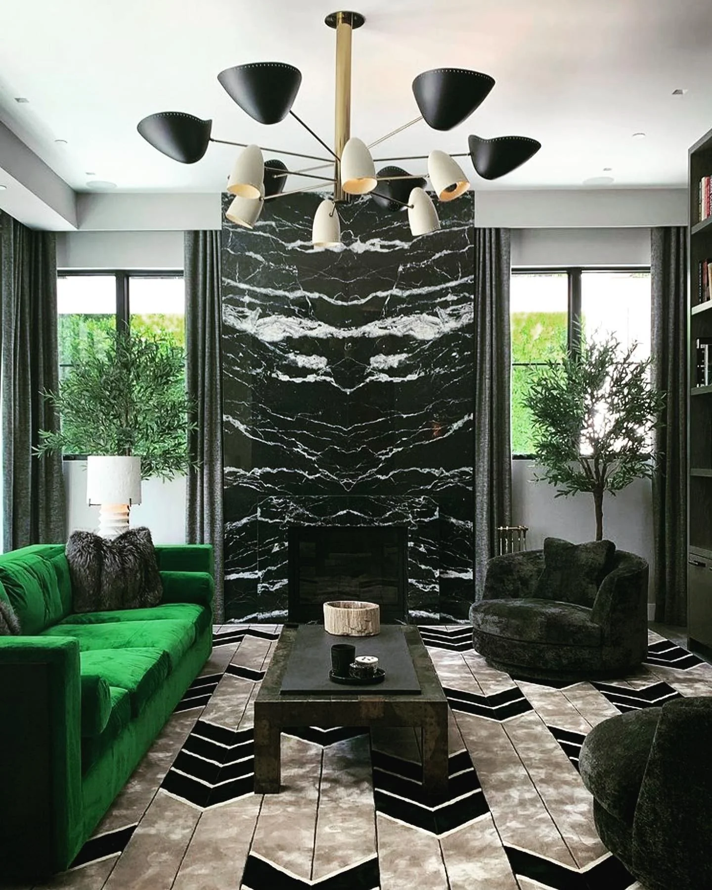 6. Bold Geometry with Emerald Accents (Black Living Room Ideas)