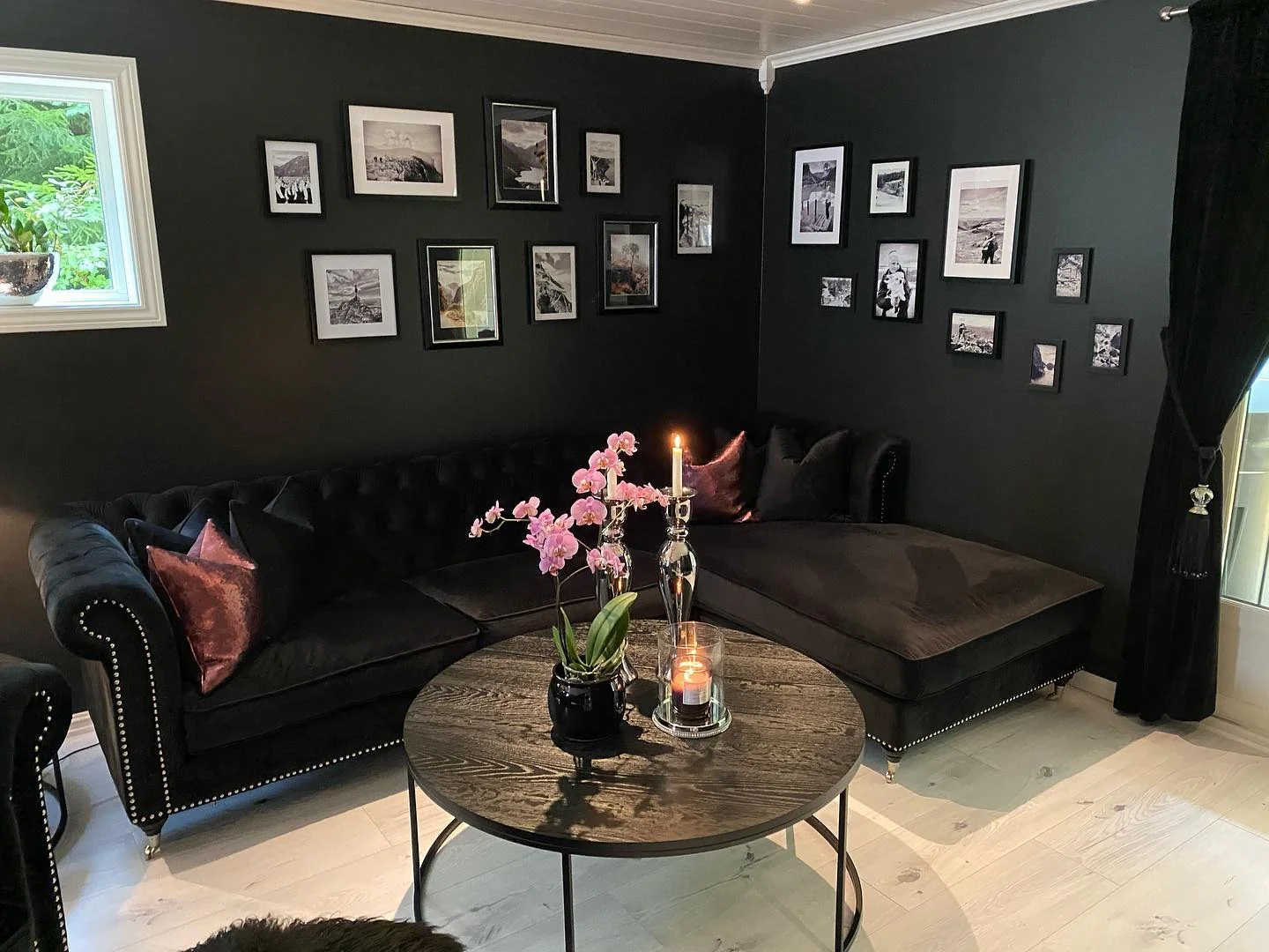 8. Cozy and Intimate with Velvet and Candlelight (Black Living Room Ideas)