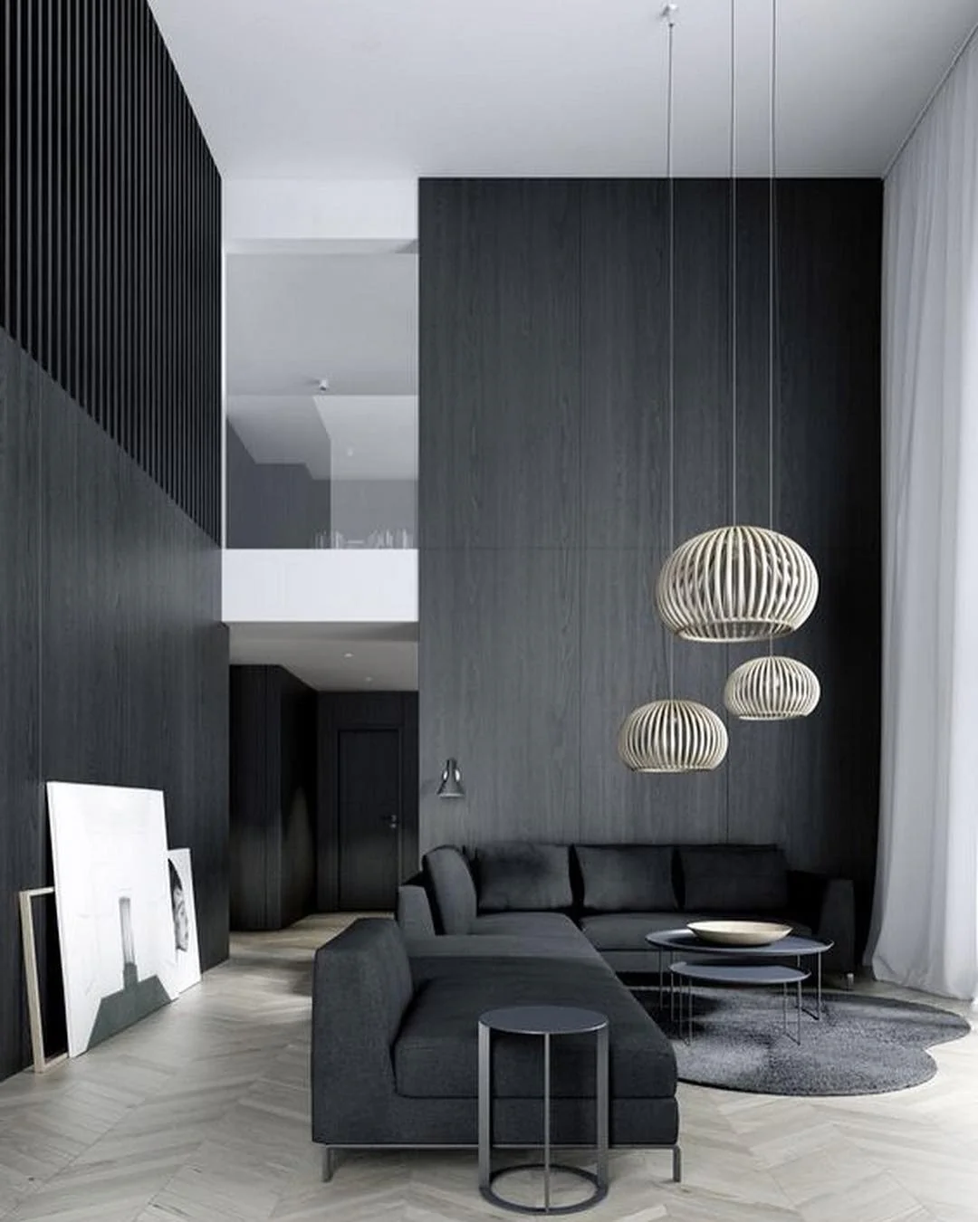 11. Scandinavian Volume with Charcoal Paneling (Black Living Room Ideas)