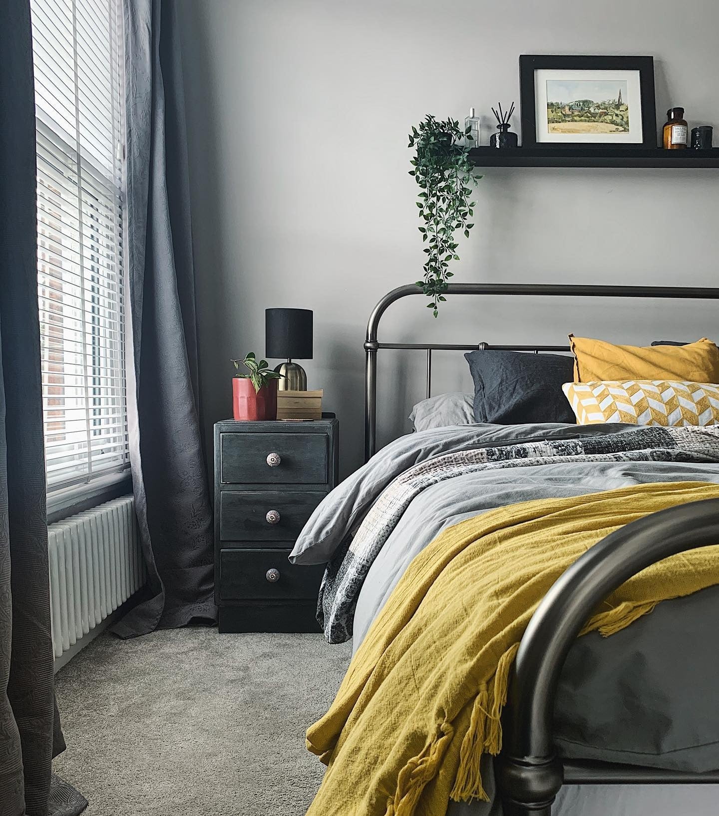 4. Layered Comfort with a Retro Touch (Yellow and Gray Bedroom Ideas)
