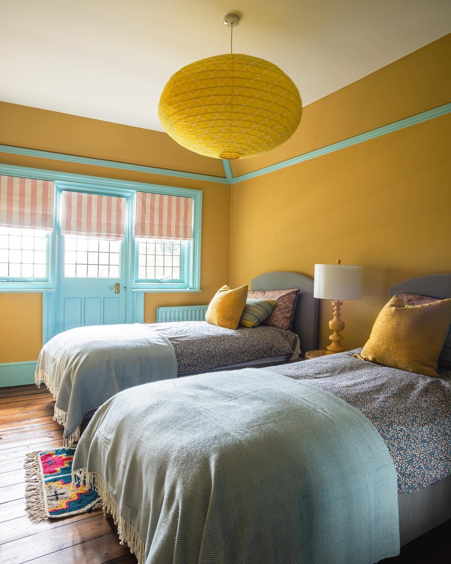 10. Eclectic Charm with Bold Framing (Yellow and Gray Bedroom Ideas)