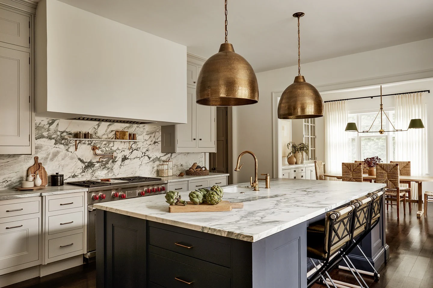 23. Traditional Elegance with Bold Brass Accents (Granite Countertops Kitchen Ideas)