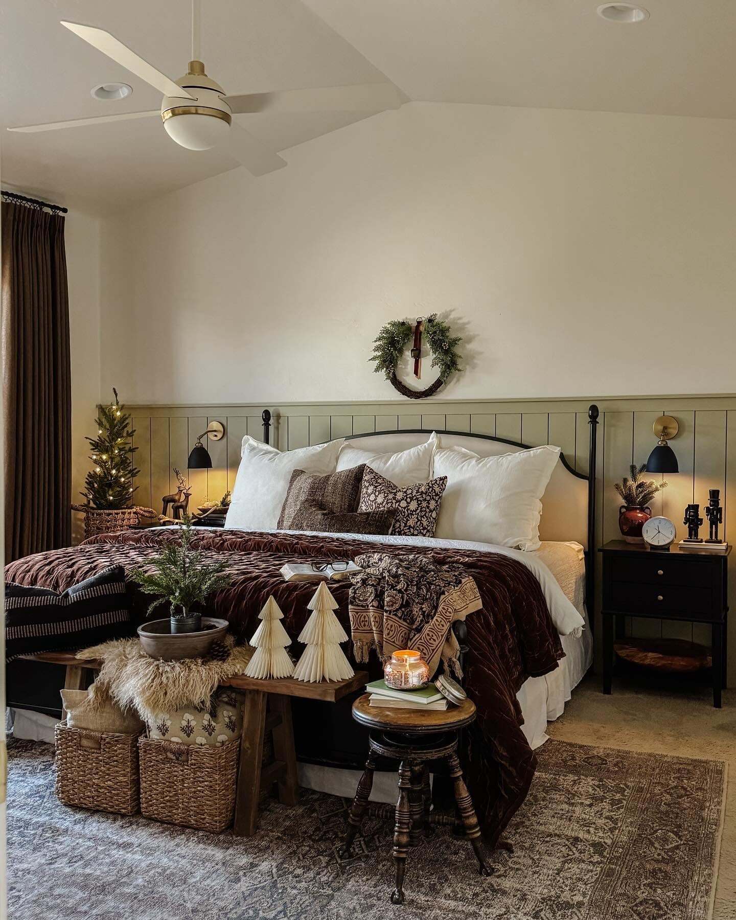 7. Moody Vintage Layers with Warm Lighting (Christmas Bedroom Ideas)