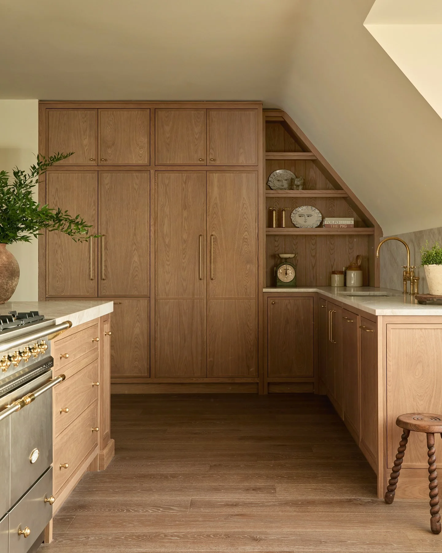 2. Tall Cabinet Wall with Hidden Storage (Oak Cabinets Kitchen Ideas)