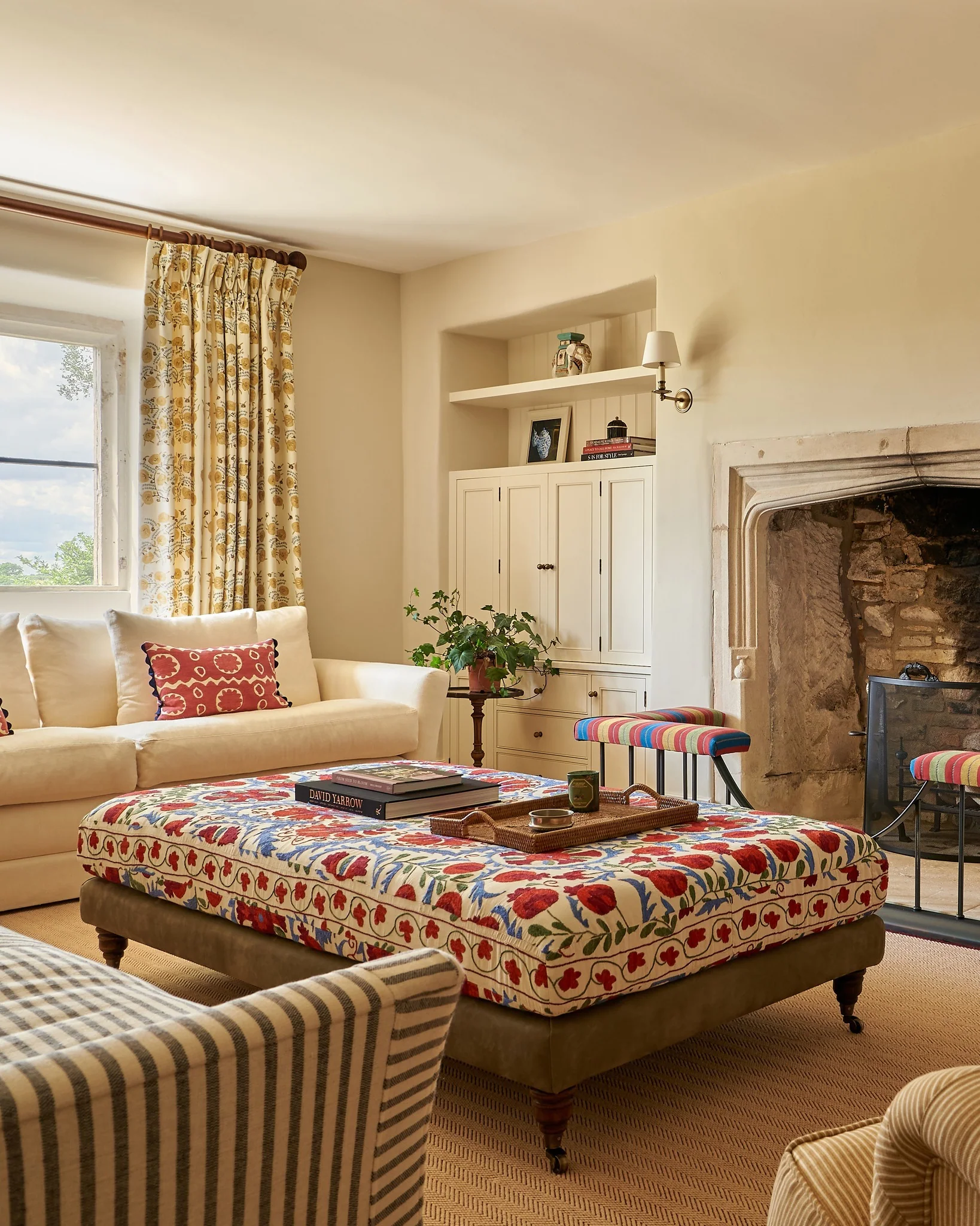 11. Floral Statement with Warm Neutrals (vintage living room ideas)