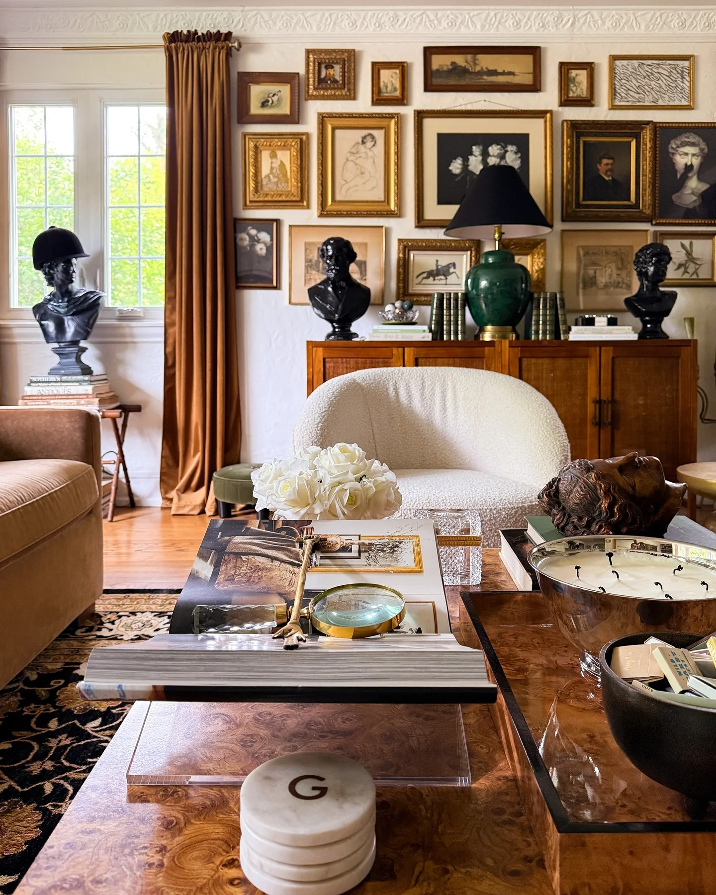 21. Eclectic Gallery Wall with Burnt Sienna (vintage living room ideas)