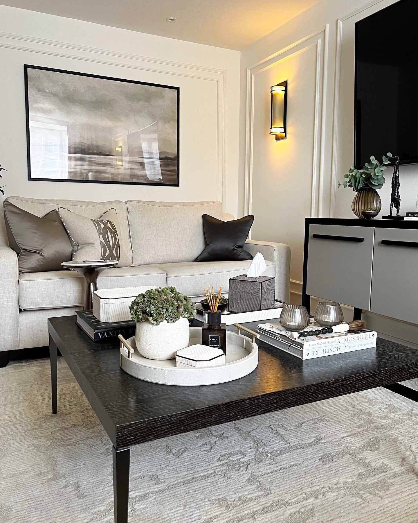 4. Modern Minimal with Contrast Highlights (Warm and Cozy Living Room Ideas)